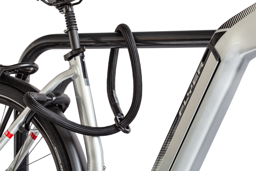 Flexible frame lock insertion chain tex-lock mate  in black secures bike frame to bike stand