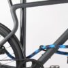 U-lock with textile extension in blue-black secures front and rear wheel and bike frame at the same time to the bike stand