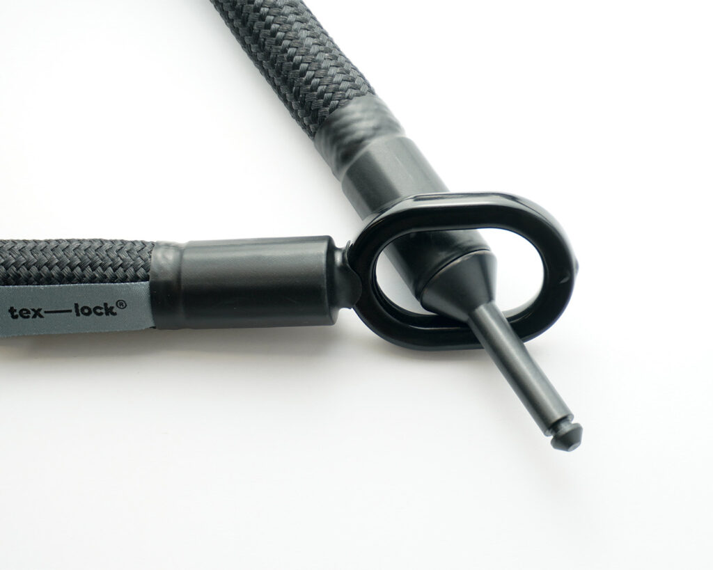 Universal steel bolt and metal eyelet from frame lock extension tex–lock mate  in black inserted into each other